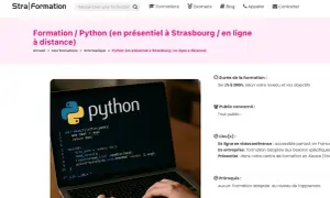 Un ordinateur portable affiche le logo Python et du code source.