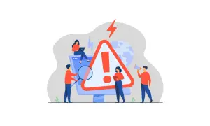 Une équipe analyse un écran d'ordinateur affichant un panneau d'avertissement, symbolisant un problème NP difficile.
